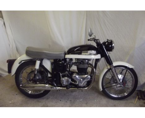 A 1960 Norton Dominator Model 99, registration YRK 260, chassis number R14/92193, black and cream. The twin-cylinder Dominato
