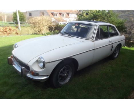 A 1971 MGBGT, registration number EHY 440K, chassis number GHD-5267324G, white. The MGB was introduced in 1962 initially as j