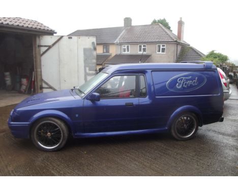 A 1989 Ford Escort Mk.4 Van Custom, registration G213 XLX, blue. Introduced in 1986, the Fourth-Generation Escort was larger 