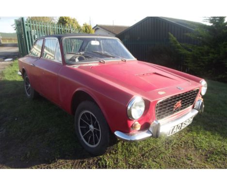 A 1969 Gilbern Genie, registration number TAD 690H, red. Founded in 1959, Gilbern Sports Cars comprised retired butcher Giles
