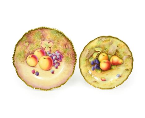 A Royal Worcester Porcelain Plate, by Albert Shuck, 1925, painted with a still life of fruit on a mossy bank within a gilt li