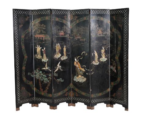 ^ A Chinese Lacquer Six-Fold Screen, late 19th/early 20th century, inlaid in ivory and hardstones and painted and gilt with f