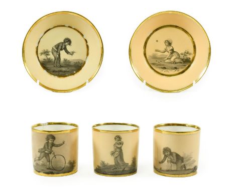 A Pair of Paris (Dihl et Guerhard) Porcelain Coffee Cans and A Saucer, circa 1790, painted en grisaille with children playing