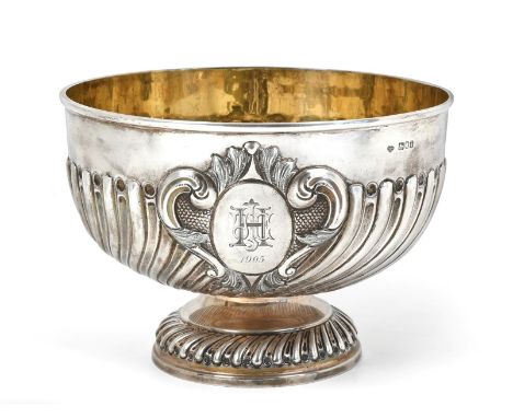 ~ An Edward VII Silver Rose-Bowl, by the Goldsmiths and Silversmiths Co. Ltd., London, 1904, tapering and with spiral-fluted 