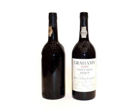 ~ Dow's 1977 Vintage Port (one bottle), Graham's 1985 Vintage Port (one bottle) (2).  seals intact, labels loose/poor, levels