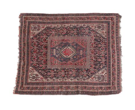 Khamseh Rug South West Iran, circa 1900 The deep indigo field of stylised plants centred by a panel with stepped medallion fr