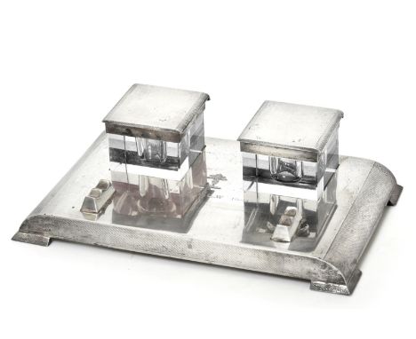 ~ A George VI Silver Inkstand, by The Goldsmiths and Silversmiths Co. Ltd., London, 1938, oblong and with engine-turned decor