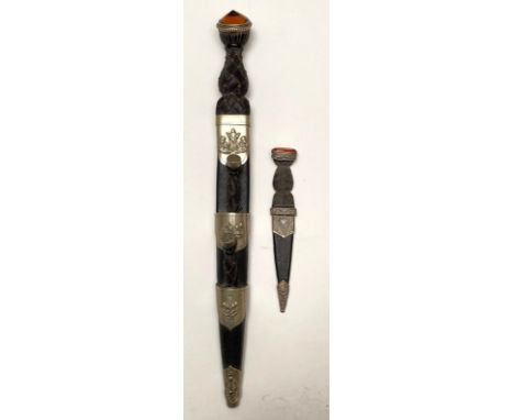 Highland Pipers Dirk by Leckie, Graham and Co. A good quality example with a 12 inch fullered blade. The hilt with wood inter