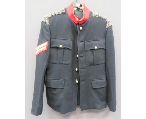 Cavalry Undress Patrol Tunic black, single breasted tunic. &nbsp;High scarlet collar. &nbsp;Pleated chest pockets with button