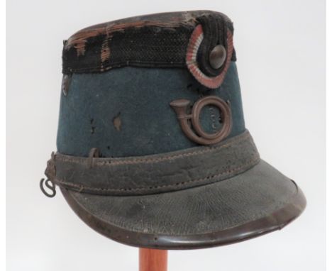 19th Century French Light Infantry Shako black patent leather crown. &nbsp;Horizon blue body with black braid to the top and 
