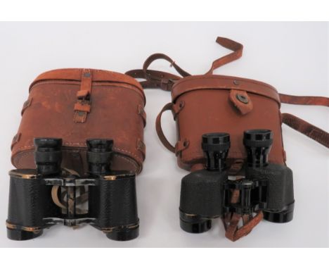 Two Pairs of Military Binoculars consisting pair 1943 dated, No 2 MKII issue binoculars. &nbsp;Black painted frames. &nbsp;Ad