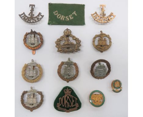 Dorsetshire Cap Badges including bi-metal 1895-1906 (lugs) ... Brass 4th Batt ... Bi-metal 4th Batt ... Bi-metal 1906-50 ... 