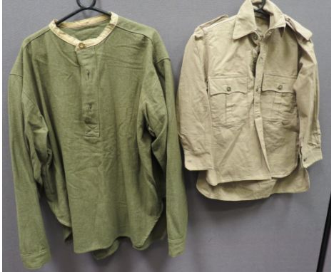 Two WW2 Issue Shirts consisting khaki woollen, collarless shirt. &nbsp;The half fastened front secured by three brass buttons