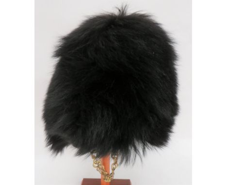 Guards Bearskin black, long fur body. &nbsp;Internal wickerwork frame. &nbsp;Leather, eight tongue lining. &nbsp;Complete wit