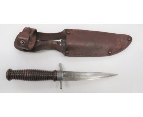 Field Made Trench Knife 5 inch, single edged blade. &nbsp;Alloy crossguard and ferrule. &nbsp;Turned wooden grip. &nbsp;Conta