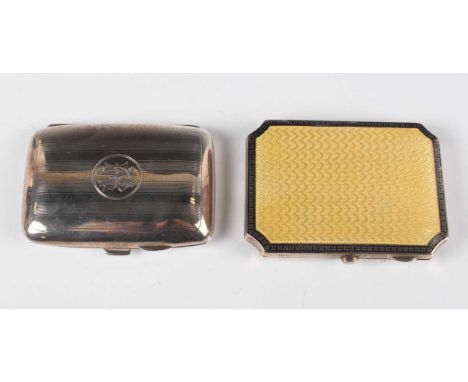 A George V silver and enamelled rectangular cigarette case with inverted corners, each side engine turned and enamelled in ye