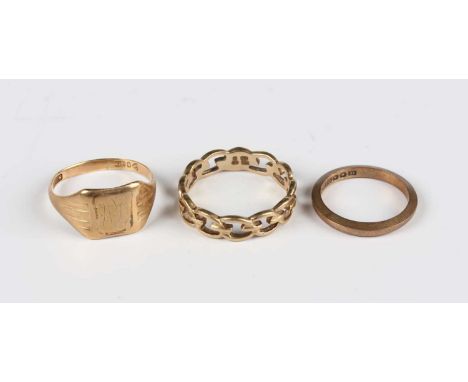 A 9ct gold signet style ring, ring size approx R, a 9ct gold wedding ring, ring size approx L, and a 9ct gold ring in a pierc