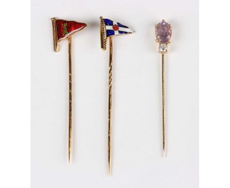 Two 9ct gold and enamelled stick pins, each designed as a yachting pennant, total weight 3.2g, with a 'Benzie of Cowes' box, 
