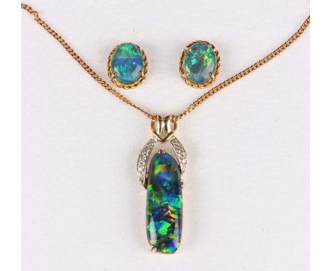 A gold, diamond and opal triplet pendant, detailed ‘14K’, weight 3.5g, length 3.3cm, with a 9ct gold curblink neckchain on a 