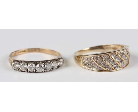 A 9ct gold and diamond ring, mounted with graduating rows of circular cut diamonds in a slanting design, ring size approx Q1/
