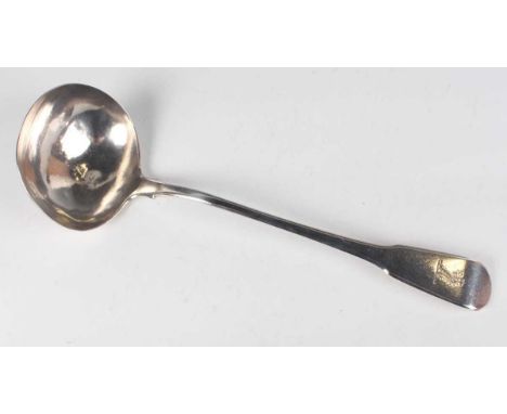 A George III silver Fiddle pattern soup ladle, crest engraved, London 1814 by Richard Britton, weight 193g, length 31cm.