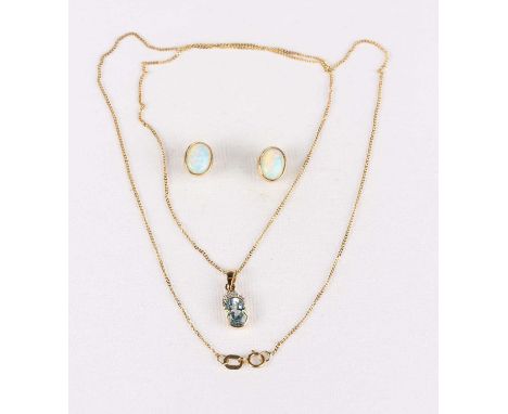 A pair of 9ct gold and oval synthetic opal single stone earstuds with post and differing butterfly fittings, and a gold, blue