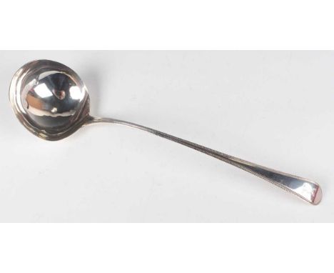 A George III silver beaded Old English pattern soup ladle, crest engraved, London 1787 by Hester Bateman, weight 130.3g, leng