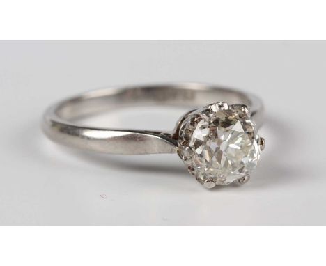 A platinum and diamond single stone ring, claw set with an old cut cushion shaped diamond, detailed 'PLAT', weight 2g, diamon