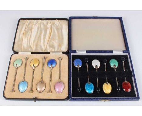A set of six George V silver and varicoloured enamel nail end coffee spoons, Birmingham 1913 by Henry Clifford Davis, cased, 