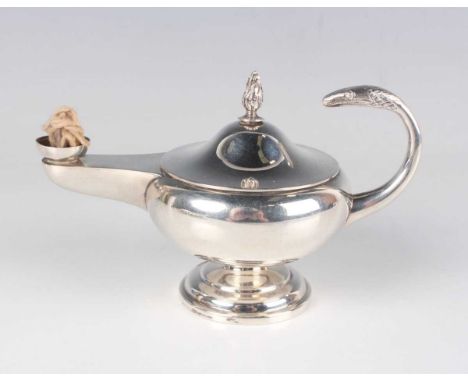 A George V silver Aladdin's lamp table lighter with snake handle, on a circular foot, London 1915 by Goldsmiths &amp; Silvers