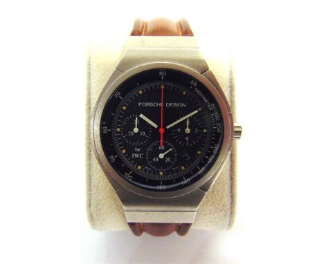 A PORSCHE DESIGN WRISTWATCH, BY I.W.C.  serial number 2505057, the dark grey face with short baton hour markers, subsidiary d