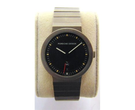 A PORSCHE DESIGN WRISTWATCH, BY I.W.C.  serial number 2545255, the black face with short baton hour markers and date aperture
