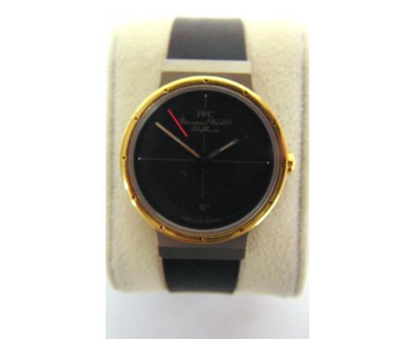 A PORSCHE DESIGN WRISTWATCH, BY I.W.C.  serial number 2357735, the black face with date aperture at 6, the titanium and yello