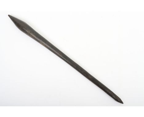 Australian aboriginal carved hardwood club, 76cm, of swollen form sharply tapered to a point, grip roughly incised with cut m