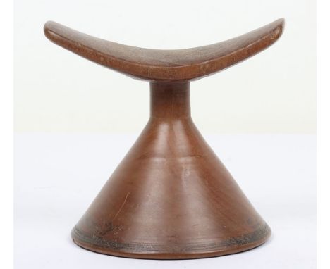 African carved wooden tribal head rest 14.5cm tall, simple cushion-shaped rest on integral conical base. Good condition and e
