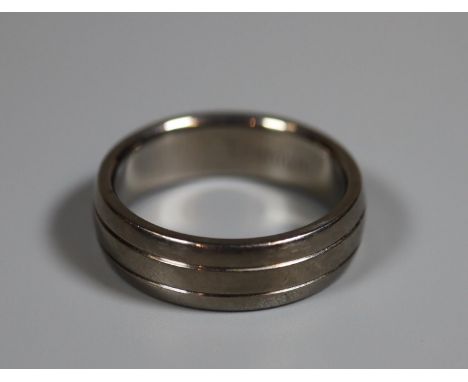 Titanium band ring.  Ring size U.  Approx weight 4.3 grams.(B.P. 21% + VAT) 