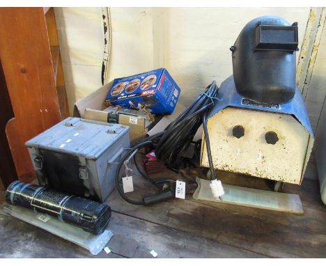 Superspark welder together with welding rods, mask, a heavy metal box containing allen keys, reamers, spanners, etc. And a Ry