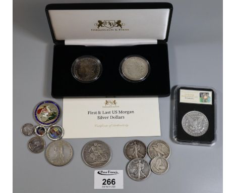 Plastic tub of silver coins to include cased first and last US Morgan silver dollars, another US silver Morgan dollar Philade