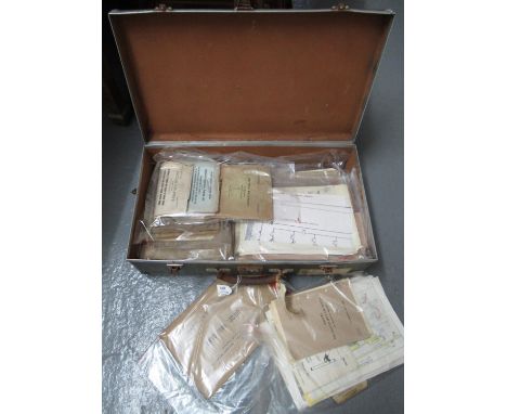 Vintage suitcase comprising British railway ephemera to include working time tables, engine men, guards, maps, freight trains