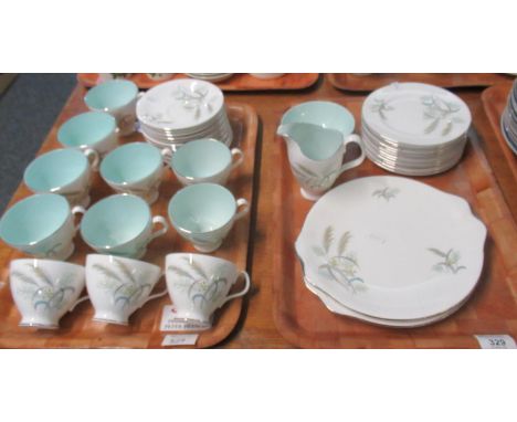 Two trays of Royal Albert fine bone china 'Festival' pattern tea ware to include: twelve saucers and eleven cups (one without