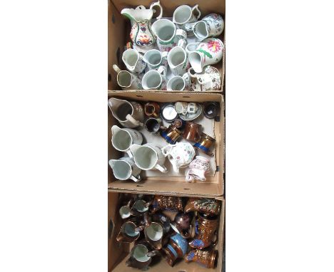 Three boxes of assorted, largely jugs, to include: a box of copper lustre jugs, various 19th and early 20th century jugs, pin