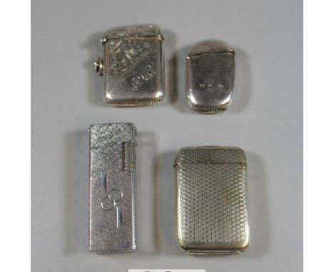 Two silver vesta cases, together with a silver plated engine turned vesta case, and a vintage Scorpio lighter. (4)(B.P. 21% +