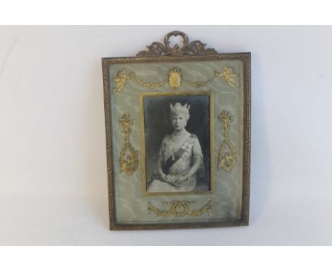 QUEEN MARY - A SIGNED PHOTOGRAPH DATED 1938, depicting Queen Mary wearing a selection of orders and sashes in a fancy gilt me