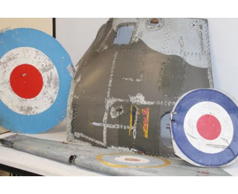 A HAWKER SIDDELEY HARRIER JET SIDE  FUSELAGE PANEL, together with two RAF roundels on metal backgrounds and a metal tail fin 