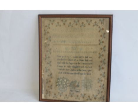 AN ANTIQUE SAMPLER IN A FRAME, religious verse to middle, with peacock and trees below, named "Jane Mantel", undated, 34 x 42