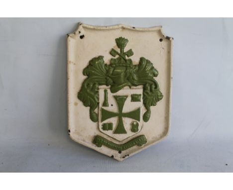 WOLVERHAMPTON COAT OF ARMS, A CAST METAL WALL PLAQUE inscribed "Out of darkness cometh light"