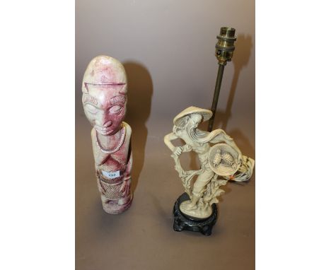 AN AFRICAN STYLE CERAMIC GORZA FIGURE + AN ORIENTAL RESIN LAMP