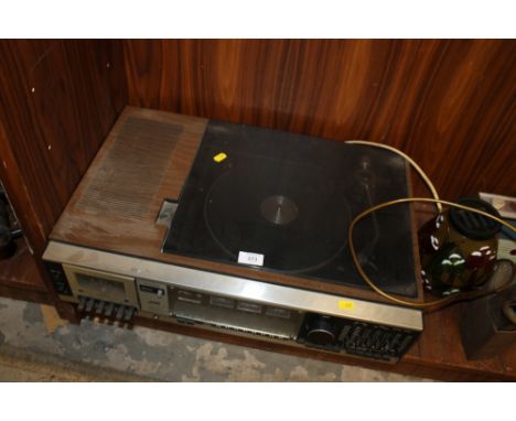 A VINTAGE JVC RECORD & TAPE PLAYER COMBO