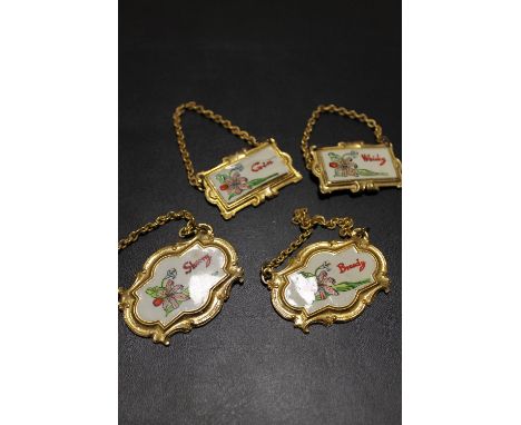 A SELECTION OF GILT DECANTER LABELS  (4)