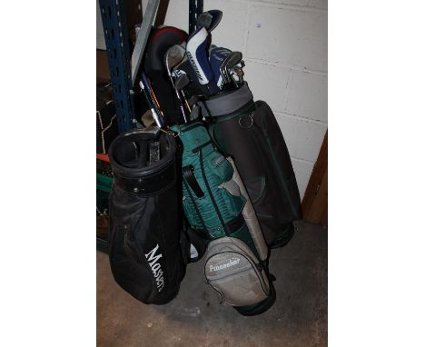 THREE BAGS PLUS A SET OF CADDY WHEELS TOGETHER WITH A SELECTION OF GOLF CLUBS